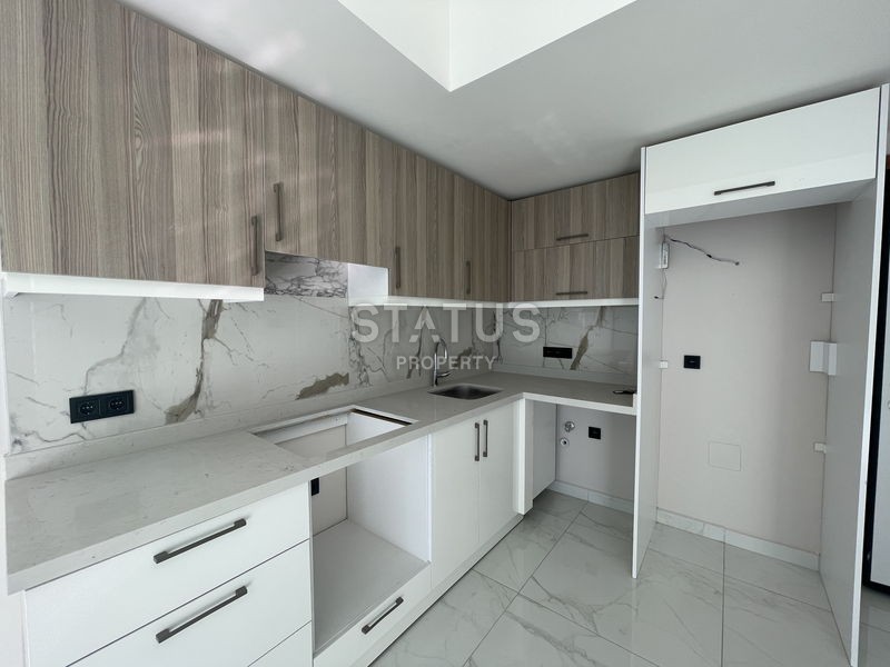 Квартира 1+1 в новом комплексе в центре Аланьи, 55 м2 (р-он Клеопатра) фото 3