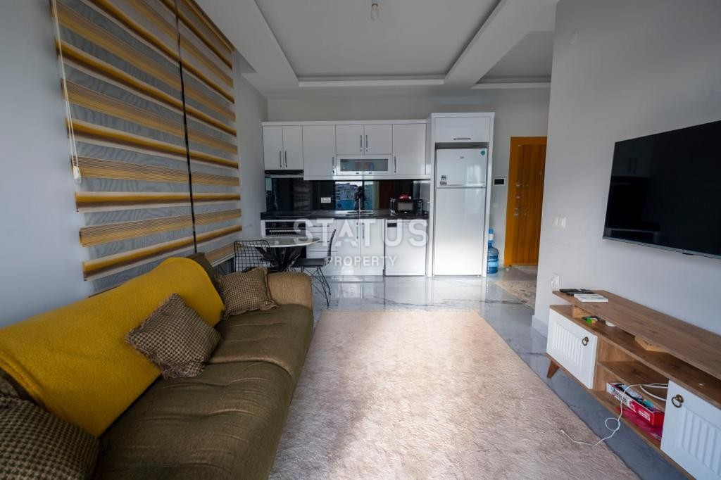 Меблированная двухкомнатная квартира в Махмутларе, 45 м2 фото 7