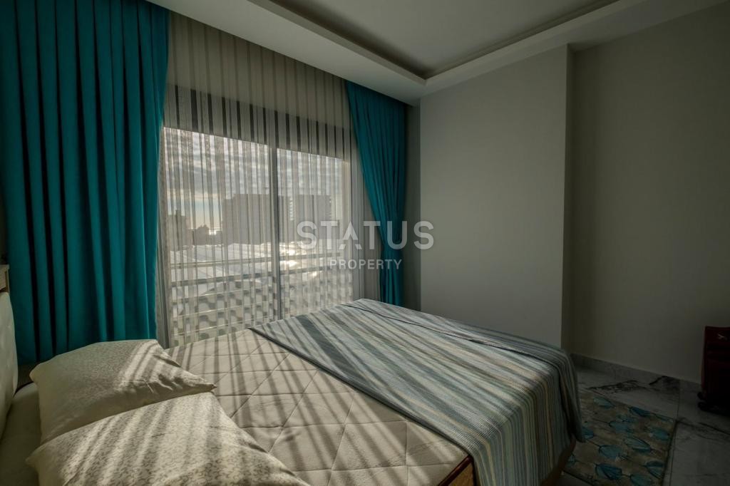 Меблированная двухкомнатная квартира в Махмутларе, 45 м2 фото 10