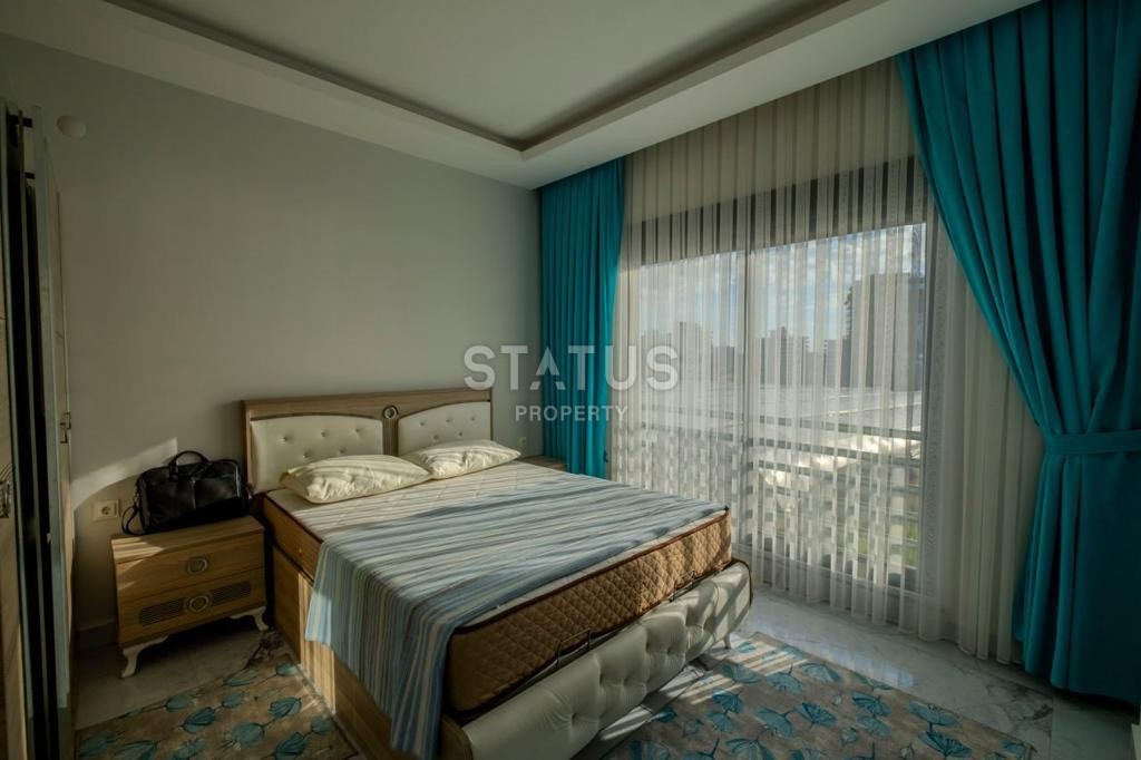 Меблированная двухкомнатная квартира в Махмутларе, 45 м2 фото 13