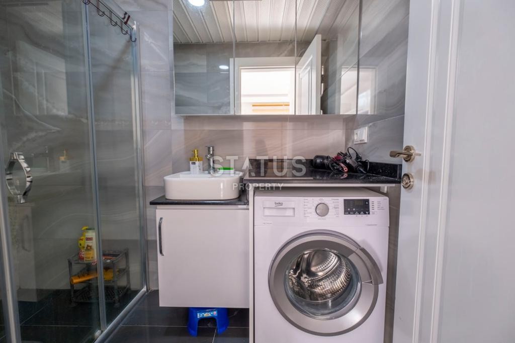 Меблированная двухкомнатная квартира в Махмутларе, 45 м2 фото 16