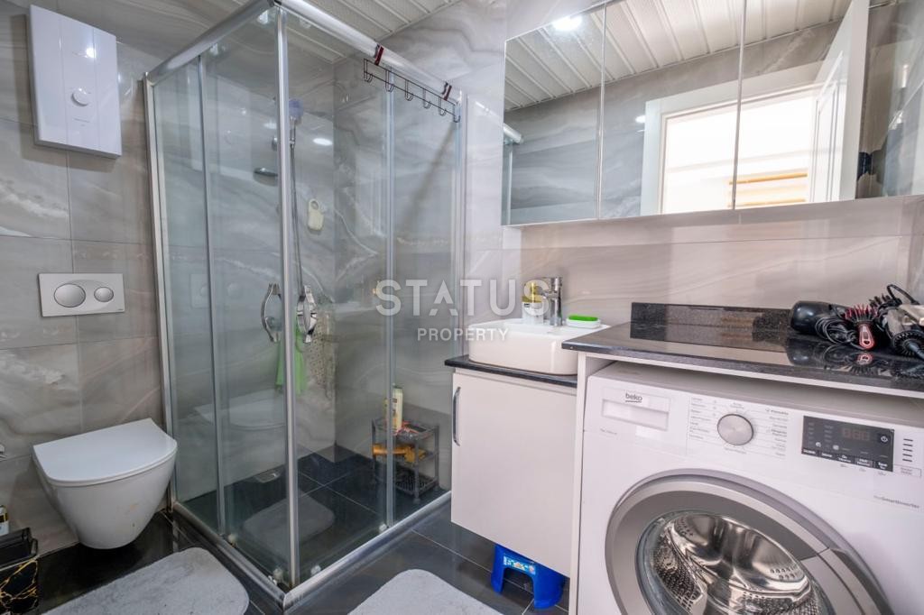 Меблированная двухкомнатная квартира в Махмутларе, 45 м2 фото 17