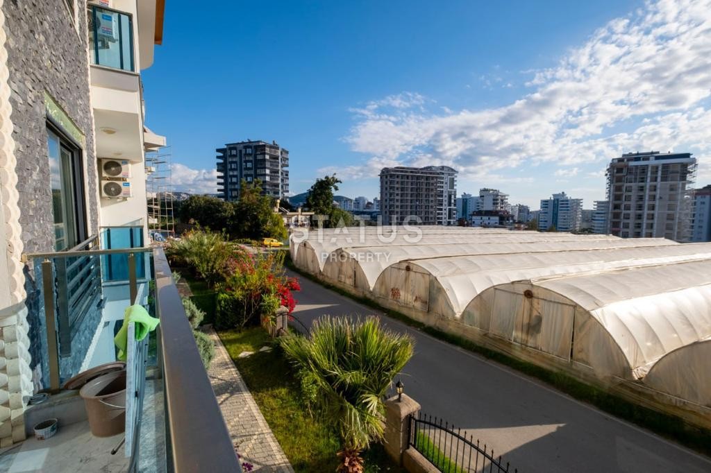 Меблированная двухкомнатная квартира в Махмутларе, 45 м2 фото 18