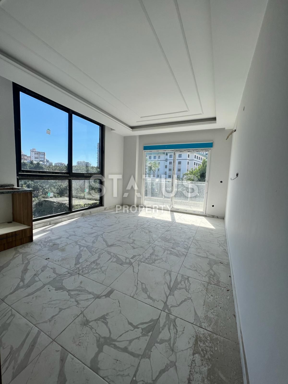 Новая квартира 1+1 в Махмутларе, 55 м2 фото 9