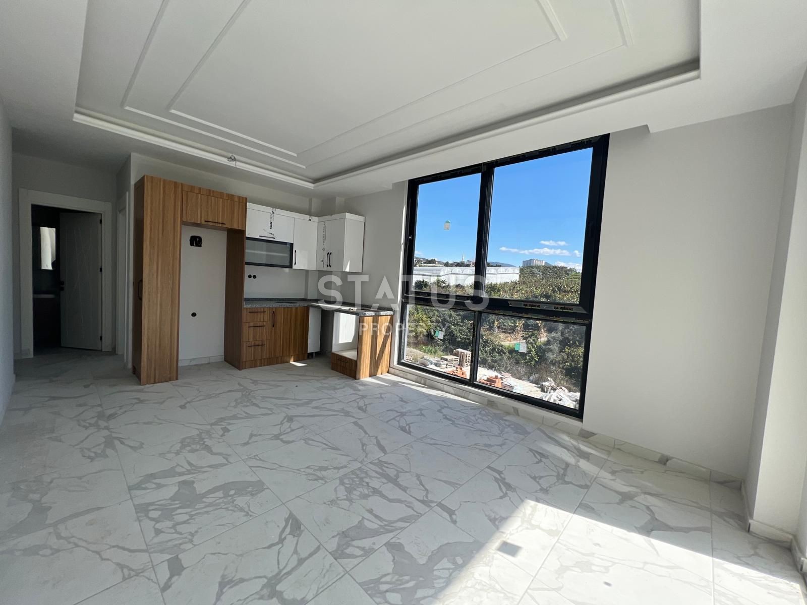 Новая квартира 1+1 в Махмутларе, 55 м2 фото 10