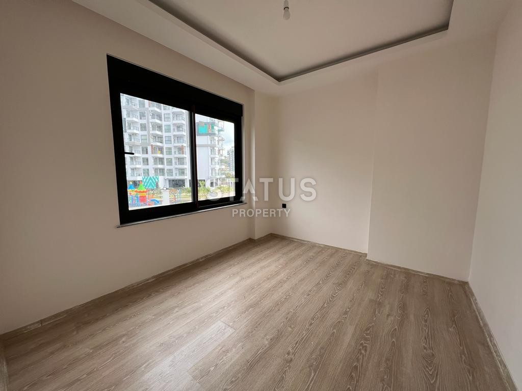 Двухкомнатная квартира в районе Махмутлар, 50 м2 фото 8