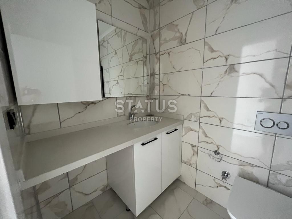 Двухкомнатная квартира в районе Махмутлар, 50 м2 фото 9