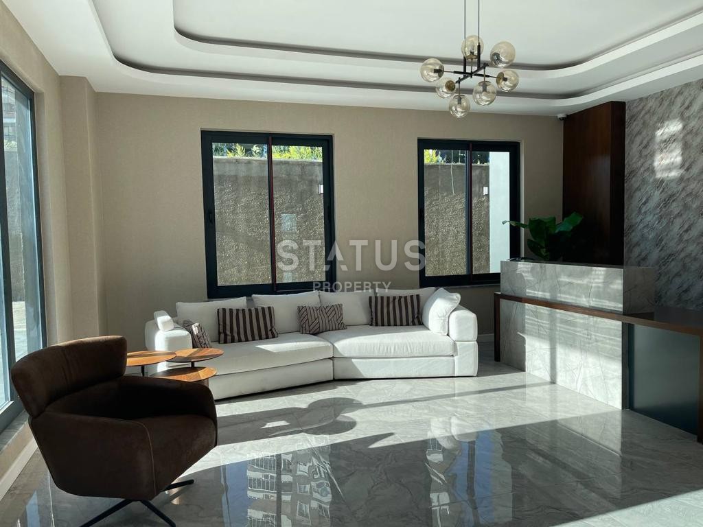 Двухкомнатная квартира в районе Махмутлар, 50 м2 фото 11