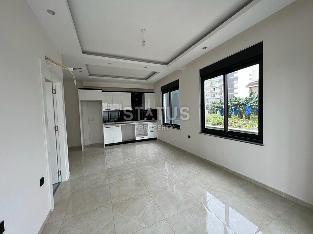 Двухкомнатная квартира в районе Махмутлар, 50 м2 фото 12