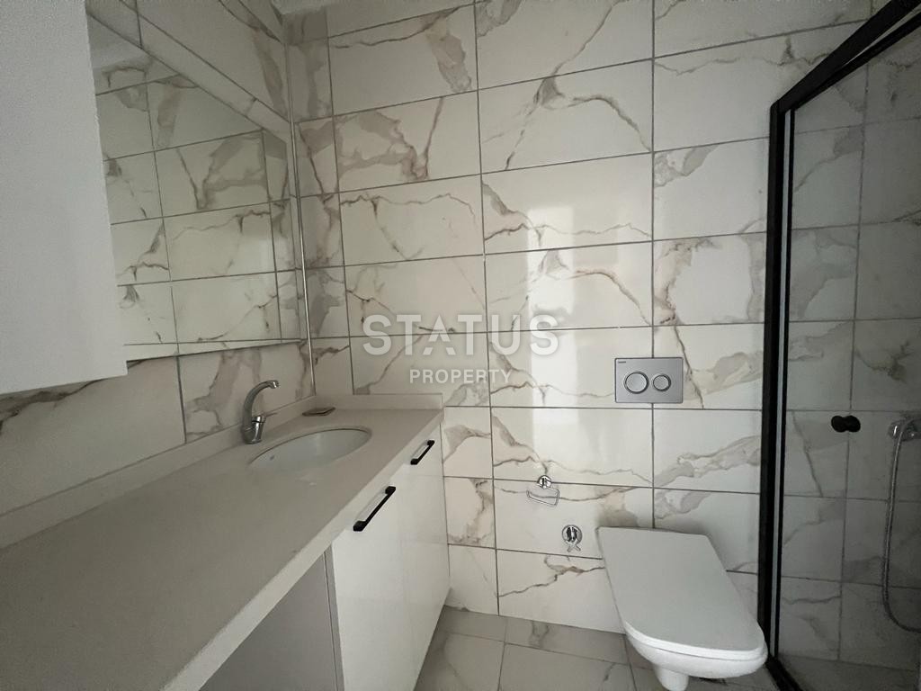 Двухкомнатная квартира в районе Махмутлар, 50 м2 фото 13