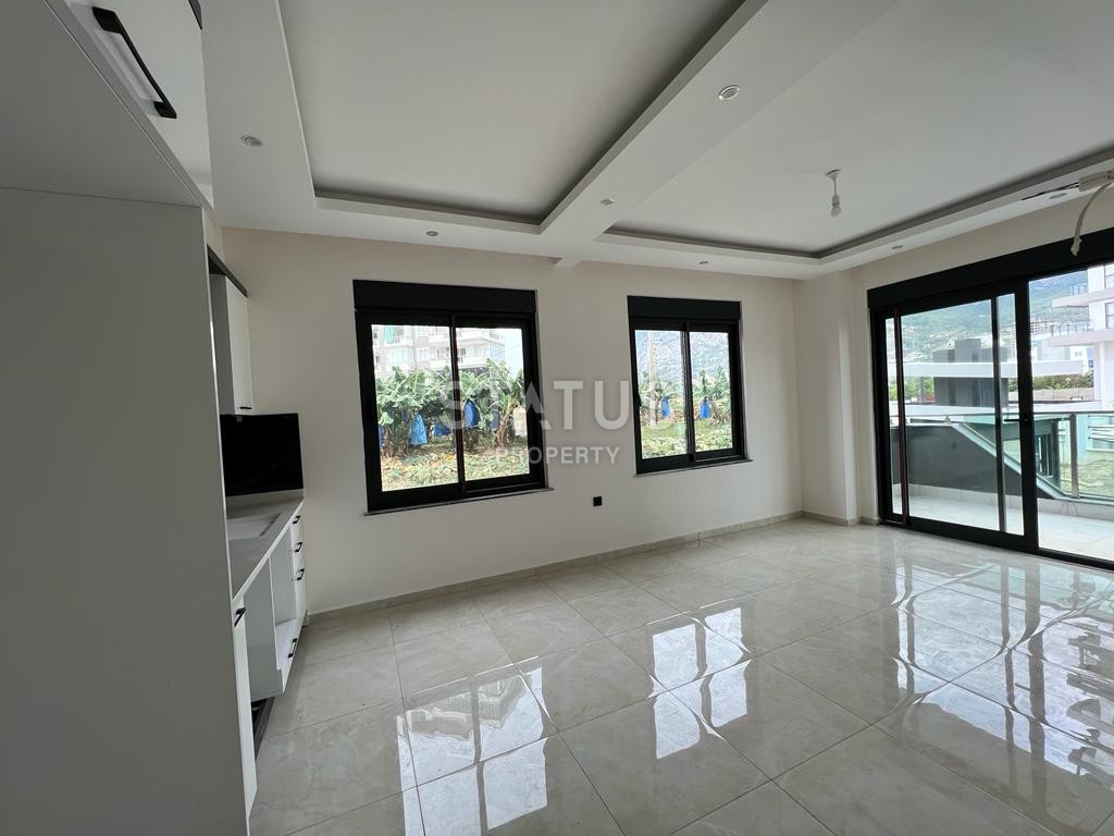 Двухкомнатная квартира в районе Махмутлар, 50 м2 фото 14