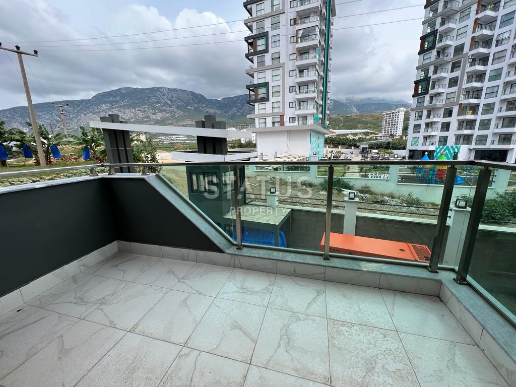 Двухкомнатная квартира в районе Махмутлар, 50 м2 фото 15