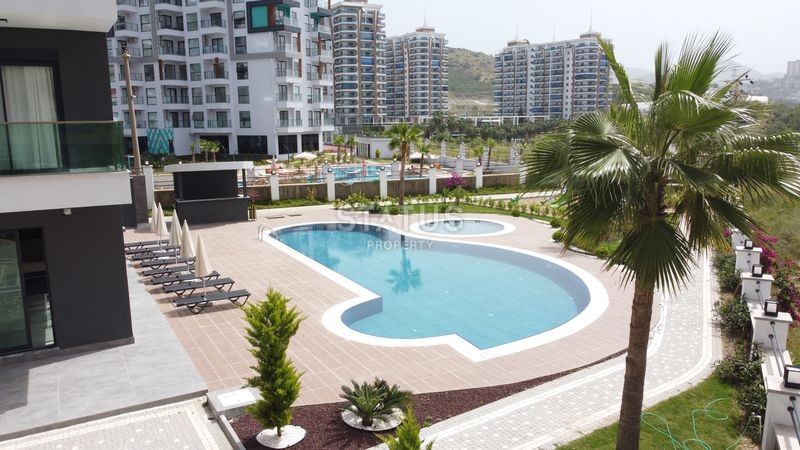 Двухкомнатная квартира в районе Махмутлар, 50 м2 фото 23