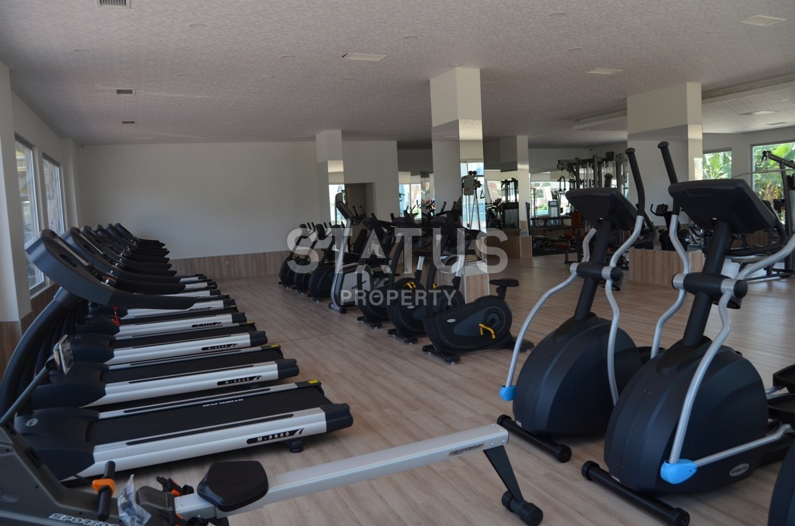 Уютные три меблированные двухкомнатные квартиры в элитном комплексе района Махмутлар фото 14