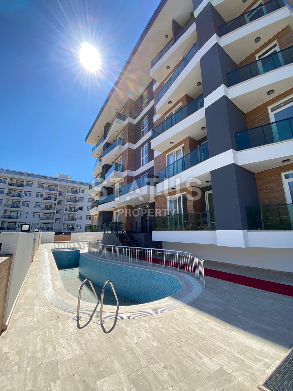 Двухкомнатная квартира в новом комплексе в Махмутларе рядом с морем, 53 м2 фото 3