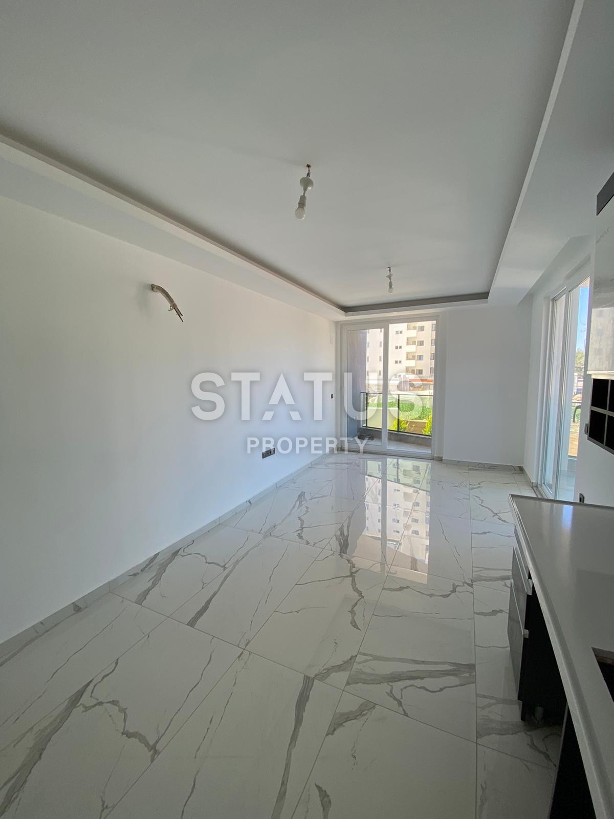 Двухкомнатная квартира в новом комплексе в Махмутларе рядом с морем, 53 м2 фото 5