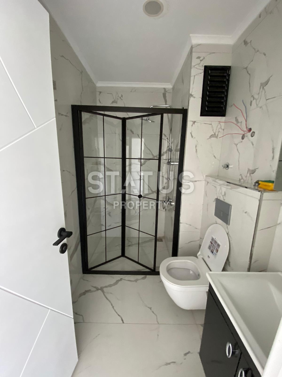 Двухкомнатная квартира в новом комплексе в Махмутларе рядом с морем, 53 м2 фото 12