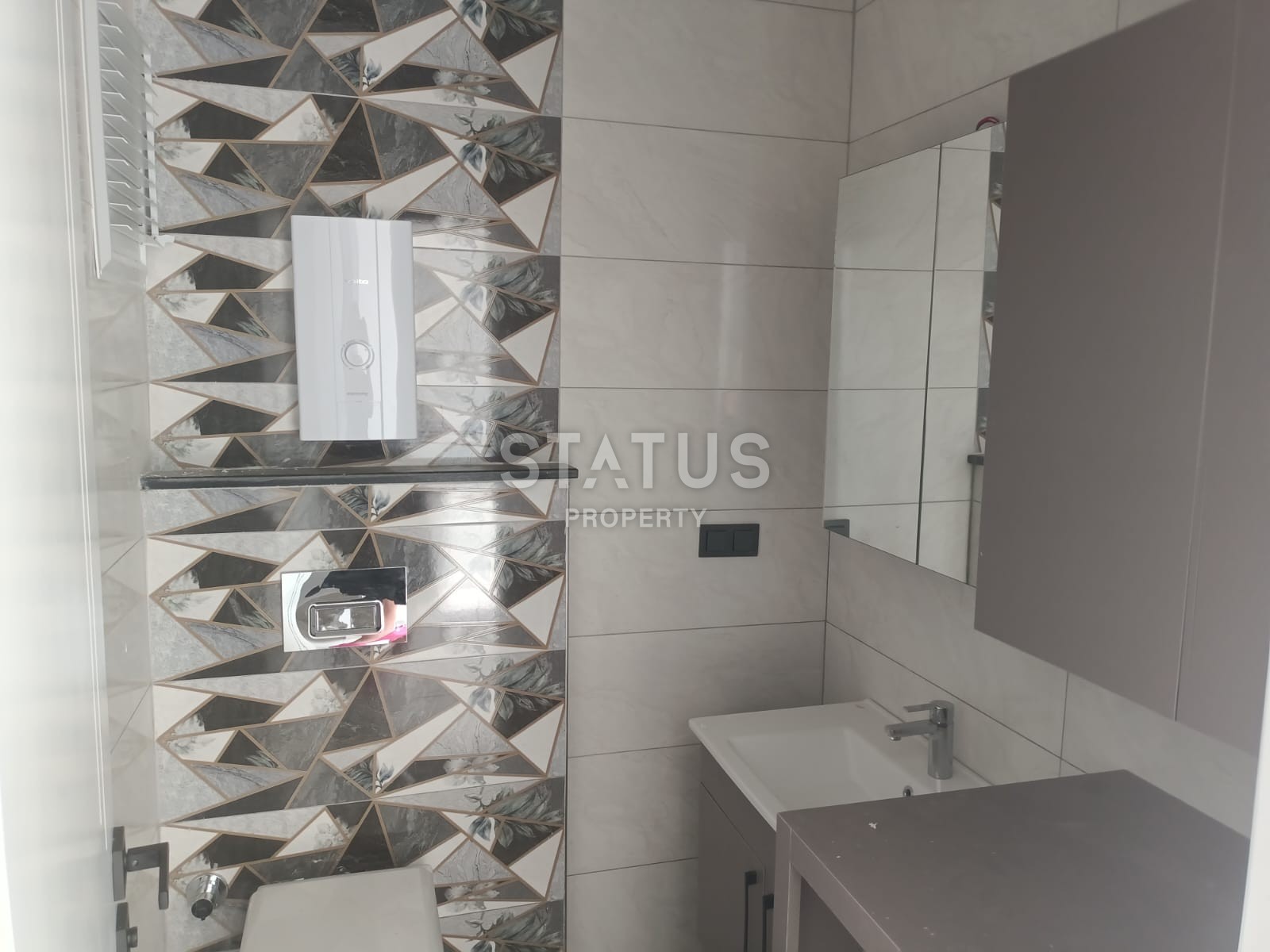 Двухкомнатная квартира в новом комплексе в Махмутларе, 55 м2 фото 9