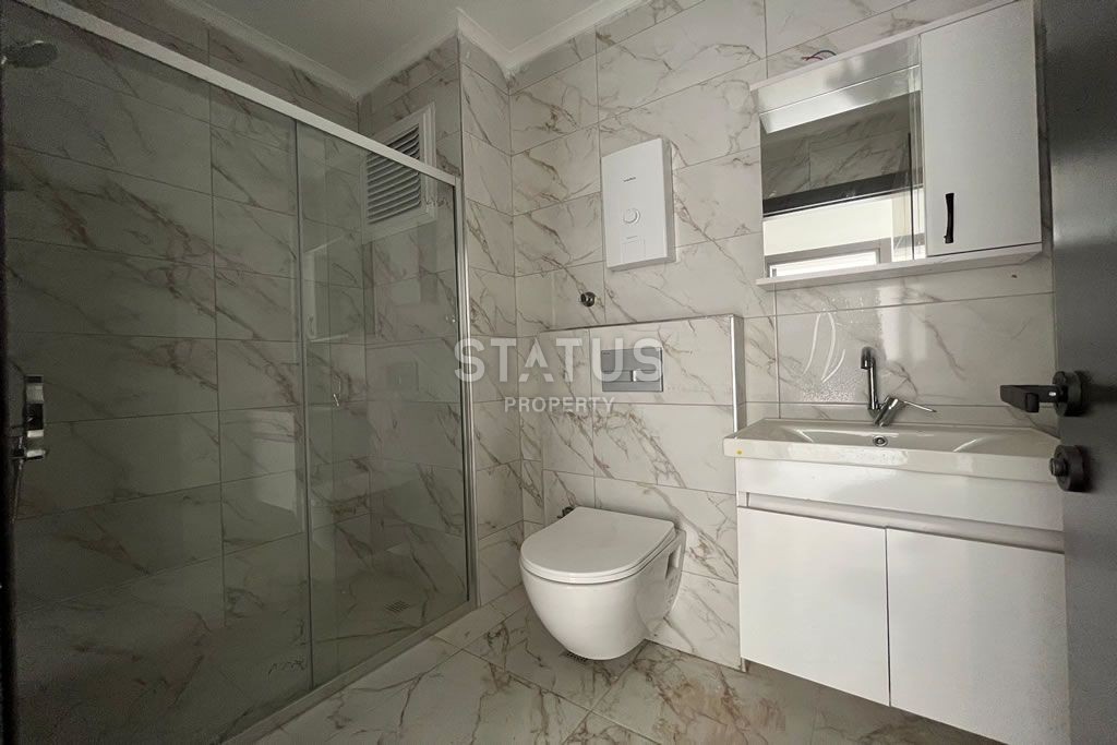 Трехкомнатная квартира в прекрасном комплексе в Махмутларе, 75 м2 фото 6