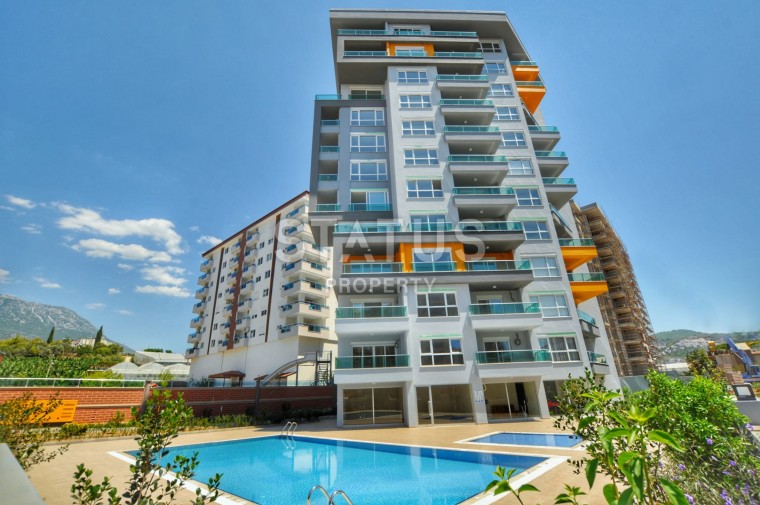 Новая меблированная квартира 1+1 в районе Махмутлар, 70 м2 фото 1