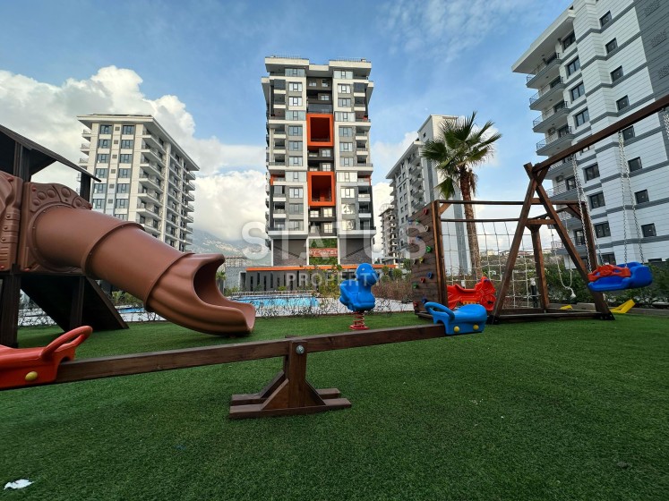 Новая квартира 1+1 с мебелью в Махмутларе, 50 м2 фото 1