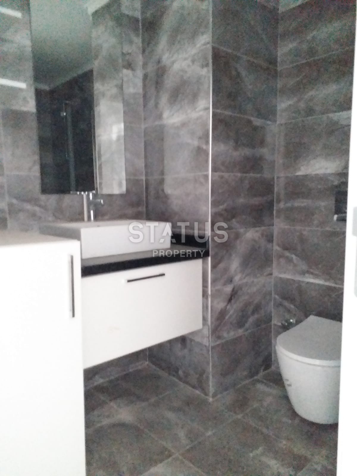 Недорогая квартира 1+1 в новом комплексе в Махмутларе, 65 м2 фото 12