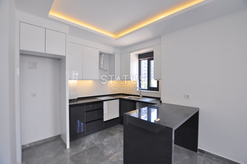 Новая квартира в Махмутларе, 48 м2 фото 4