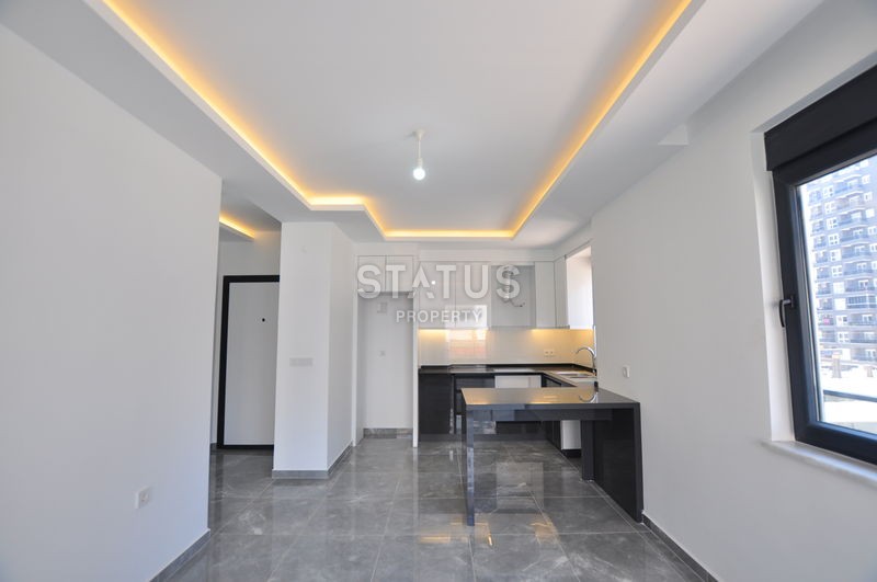 Новая квартира в Махмутларе, 48 м2 фото 6