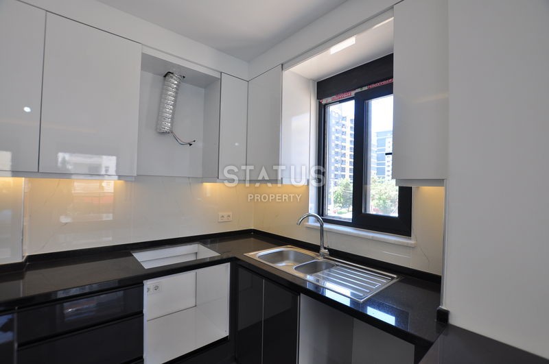 Новая квартира в Махмутларе, 48 м2 фото 8