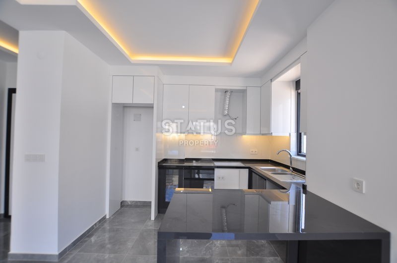 Новая квартира в Махмутларе, 48 м2 фото 9