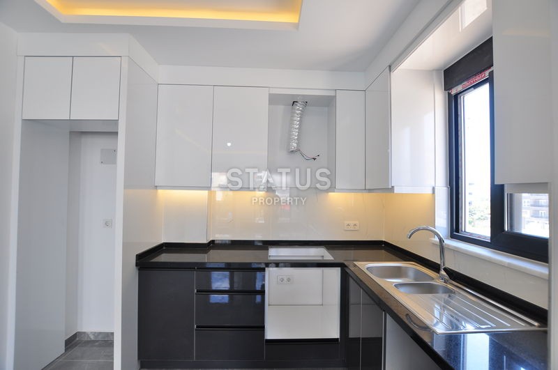 Новая квартира в Махмутларе, 48 м2 фото 11