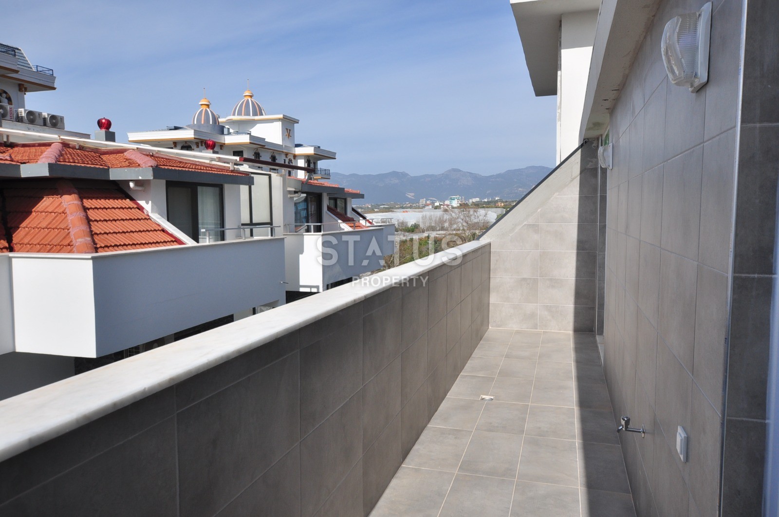 Квартиры в новом доме в Махмутларе, 55-110 м2 фото 30