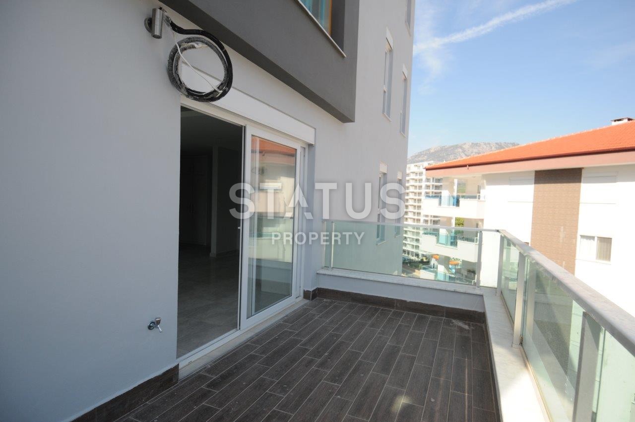 Двухкомнатная квартира от собственника в новом доме в районе Махмутлар по хорошей цене фото 9