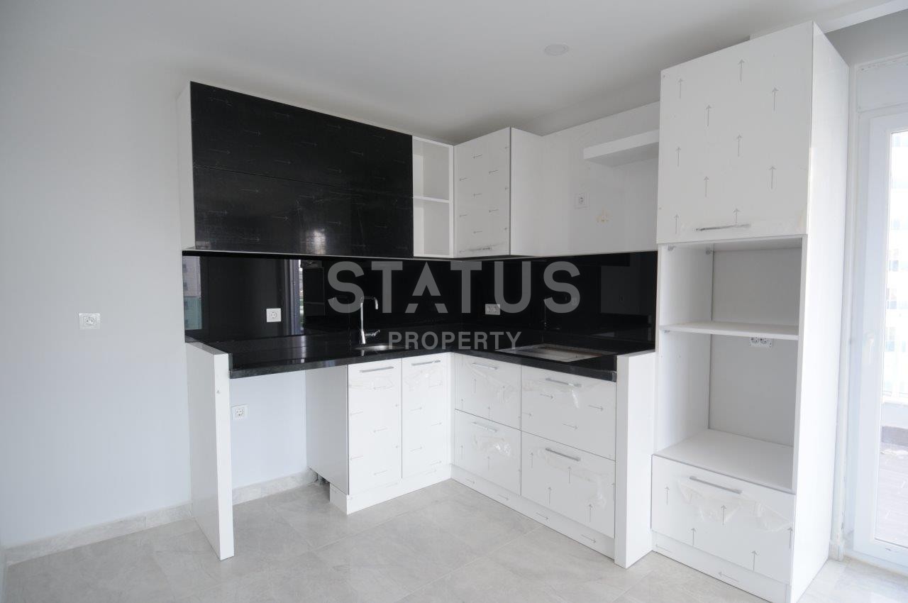 Двухкомнатная квартира от собственника в новом доме в районе Махмутлар по хорошей цене фото 10