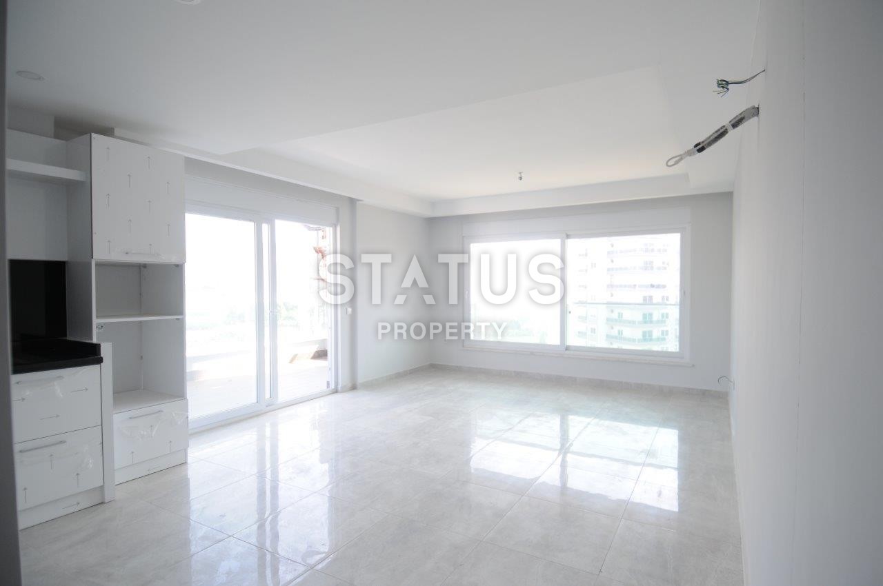 Двухкомнатная квартира от собственника в новом доме в районе Махмутлар по хорошей цене фото 11