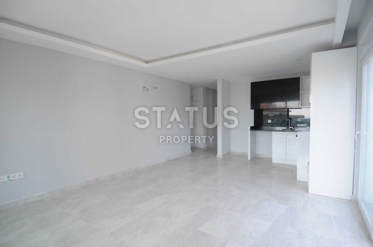 Двухкомнатная квартира от собственника в новом доме в районе Махмутлар по хорошей цене фото 12