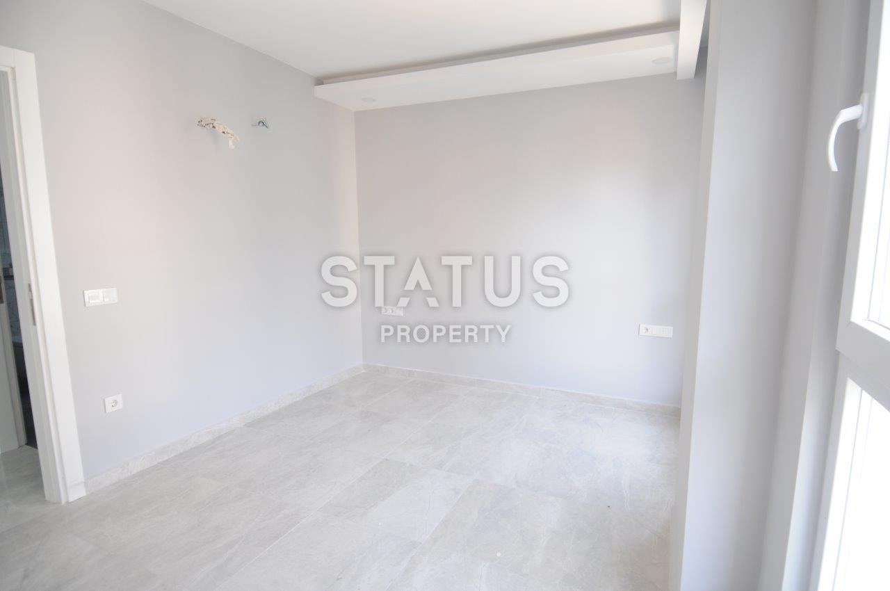 Двухкомнатная квартира от собственника в новом доме в районе Махмутлар по хорошей цене фото 14