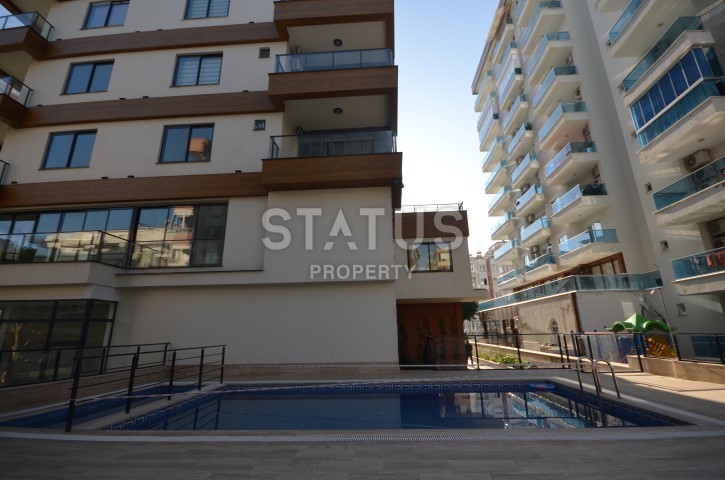 Двухкомнатная квартира с мебелью в новом комплексе в Махмутларе, 70 м2 фото 12