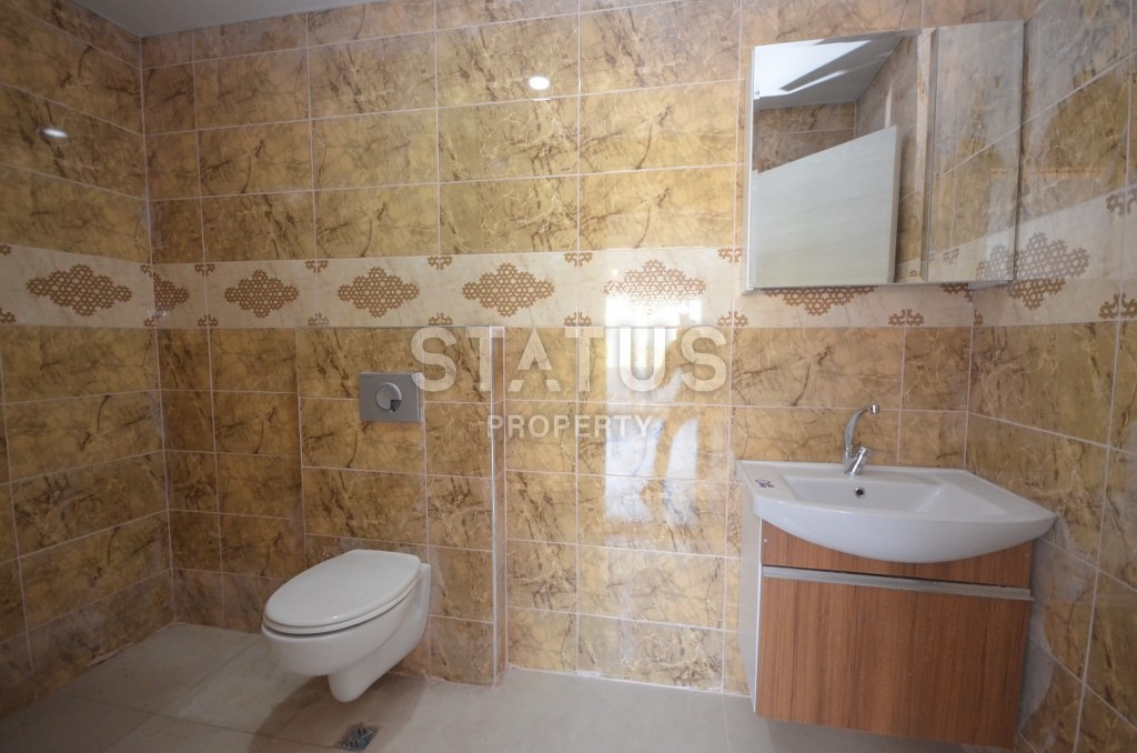 Двухуровневые апартаменты с видом на горы в новом комплексе. Махмутлар, 105 кв. м. фото 14