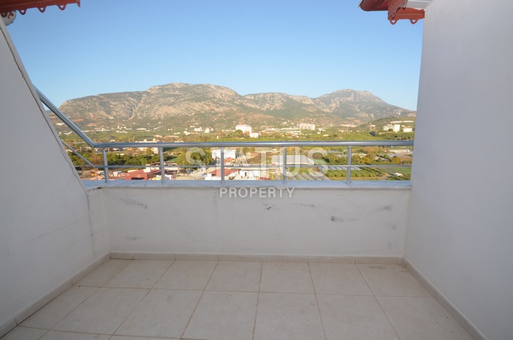 Двухуровневые апартаменты с видом на горы в новом комплексе. Махмутлар, 105 кв. м. фото 16