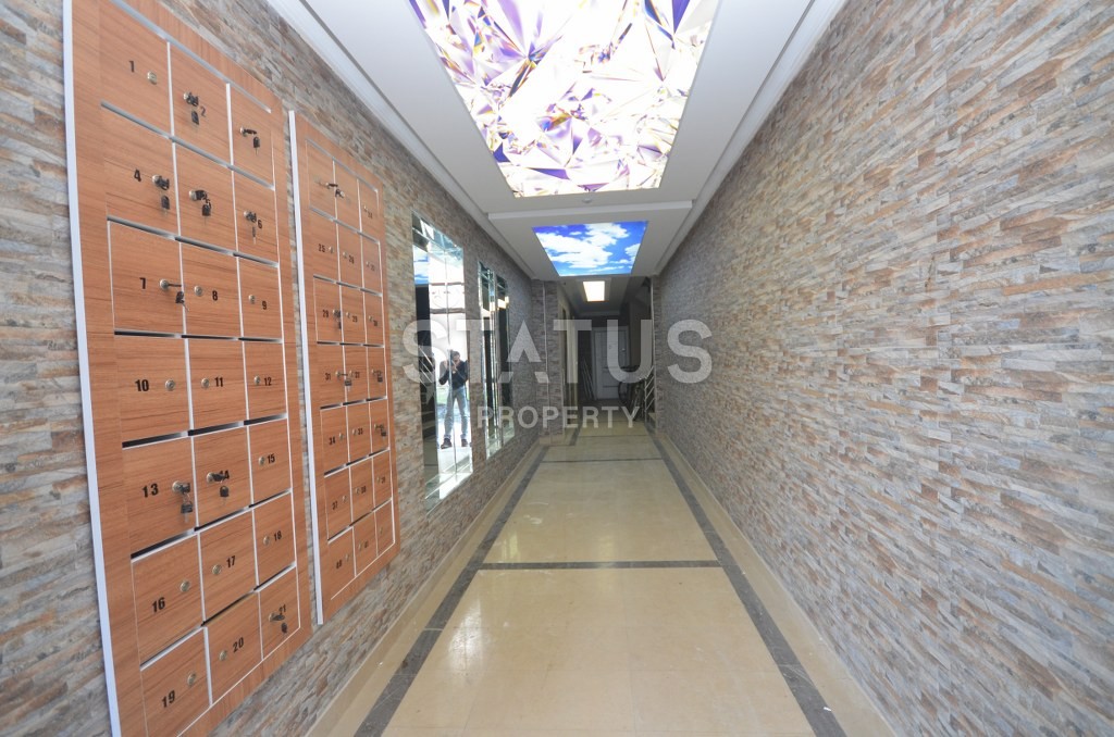 Двухуровневые апартаменты с видом на горы в новом комплексе. Махмутлар, 105 кв. м. фото 19