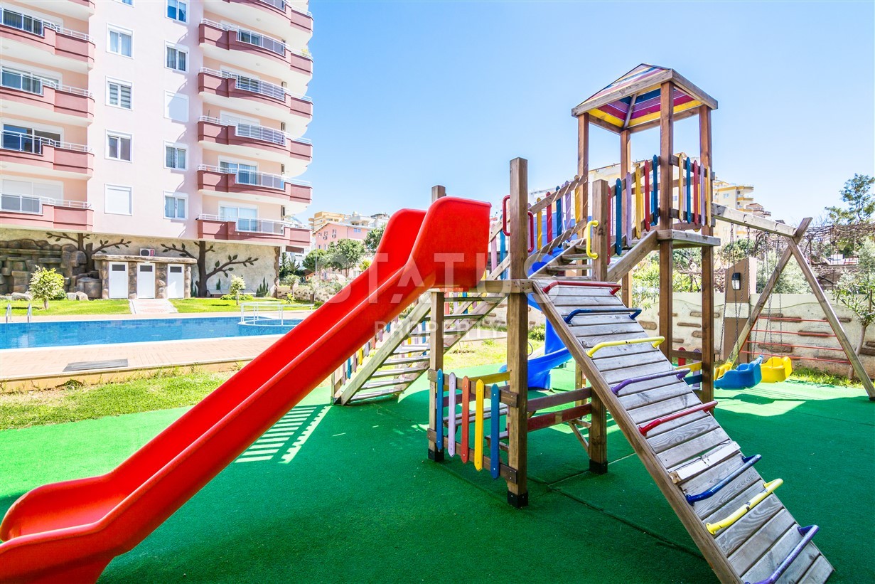 Апартаменты у моря для большой семьи в современном комплексе в центре Махмутлара фото 3