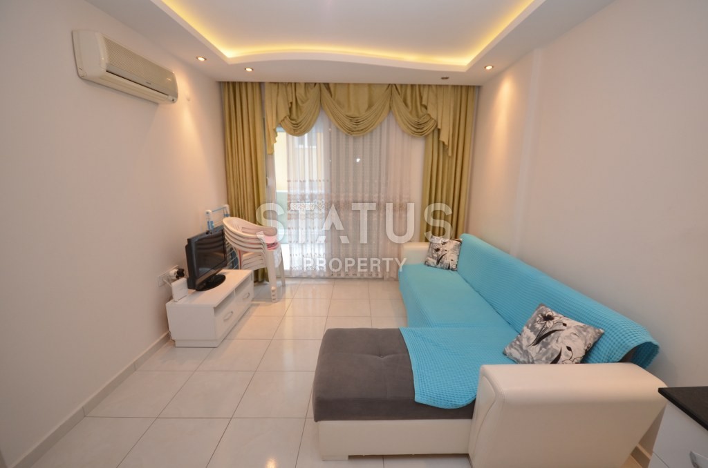 Двухкомнатная квартира с мебелью в 5 минутах от побережья Махмутлара, 65 кв. м. фото 4