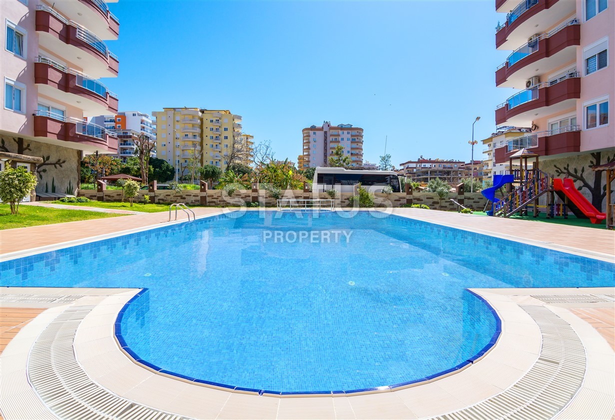 Апартаменты у моря для большой семьи в современном комплексе в центре Махмутлара фото 1