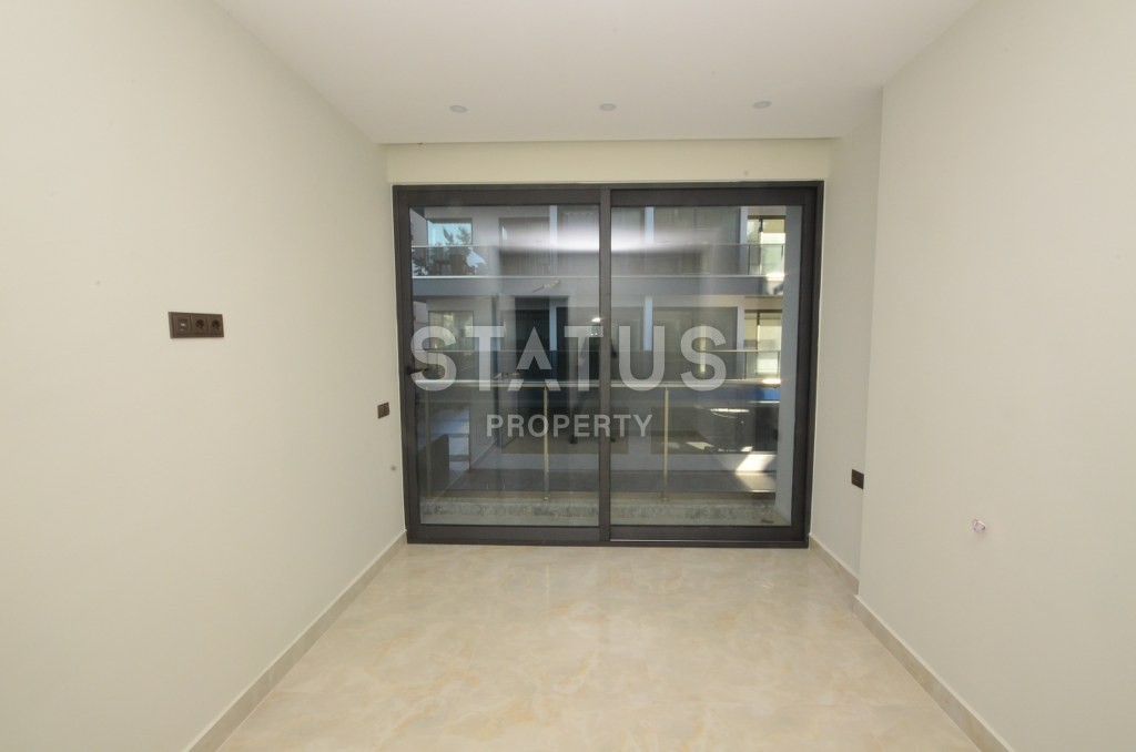 Трехкомнатная квартира на первой береговой линии в Махмутларе, 80 м2 фото 12