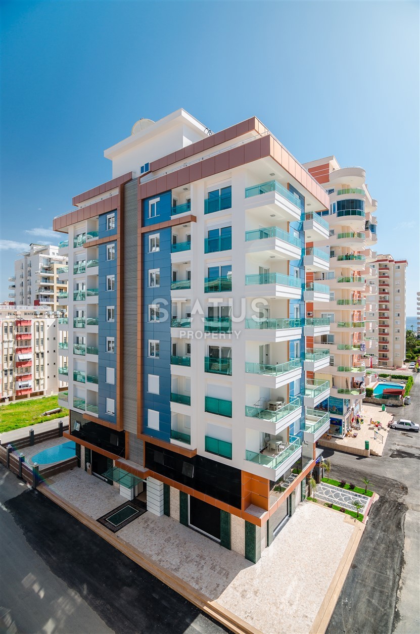 Недвижимость в Алании  у самого берега моря в популярном районе Махмутлар фото 2