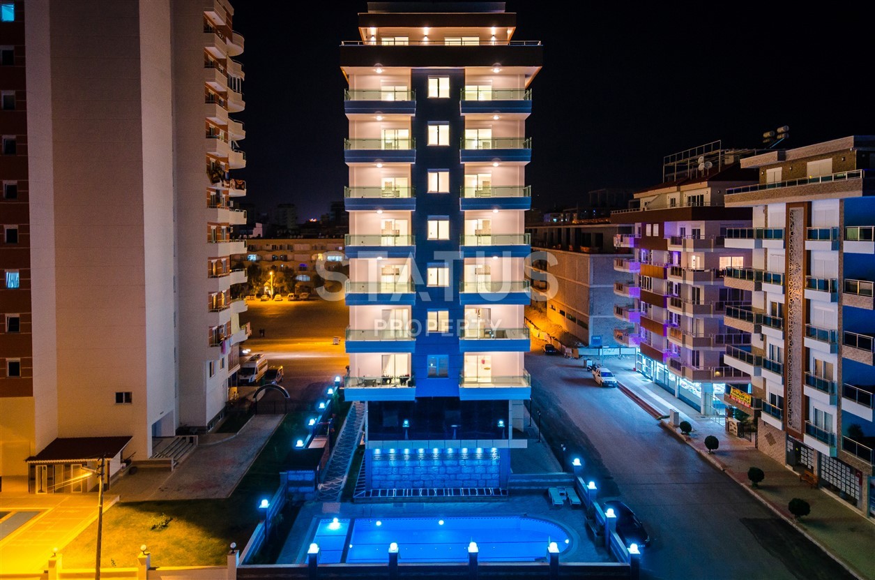 Недвижимость в Алании  у самого берега моря в популярном районе Махмутлар фото 3