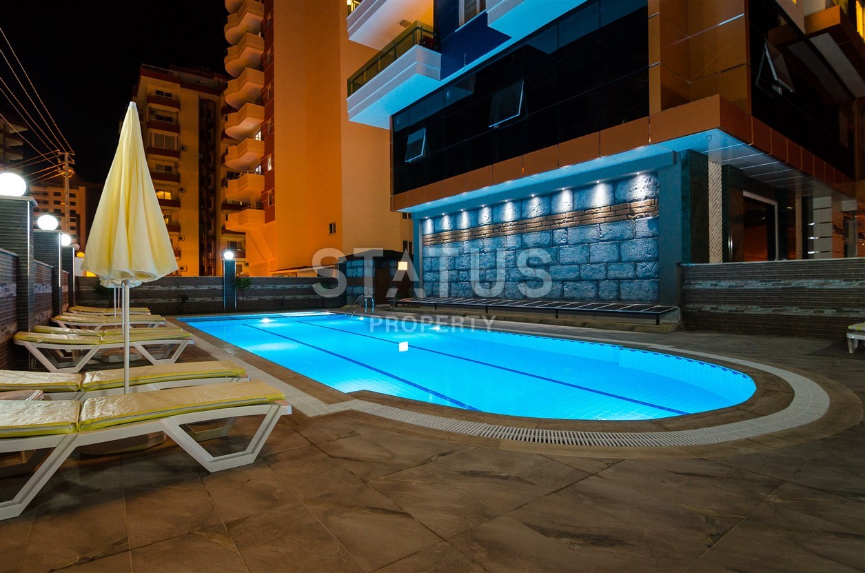 Недвижимость в Алании  у самого берега моря в популярном районе Махмутлар фото 5