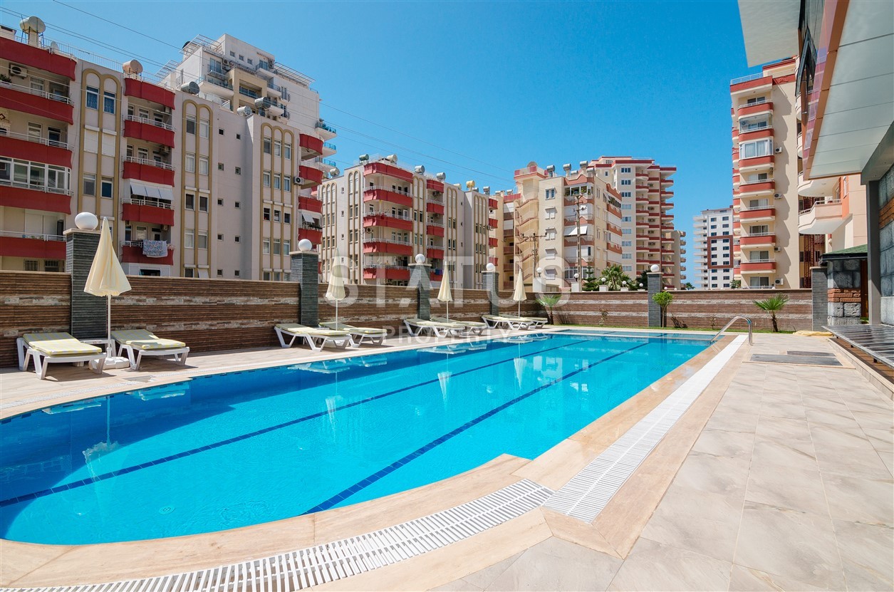 Недвижимость в Алании  у самого берега моря в популярном районе Махмутлар фото 7