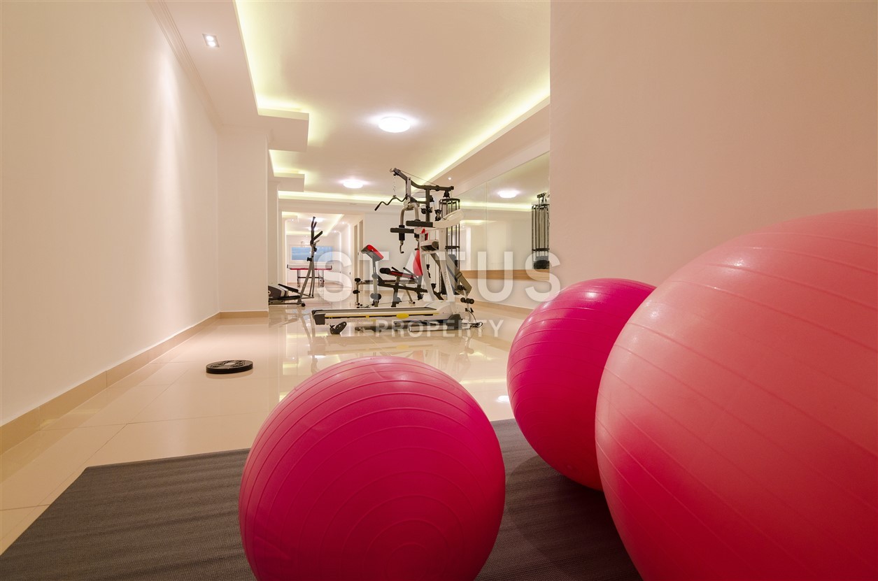 Недвижимость в Алании  у самого берега моря в популярном районе Махмутлар фото 9